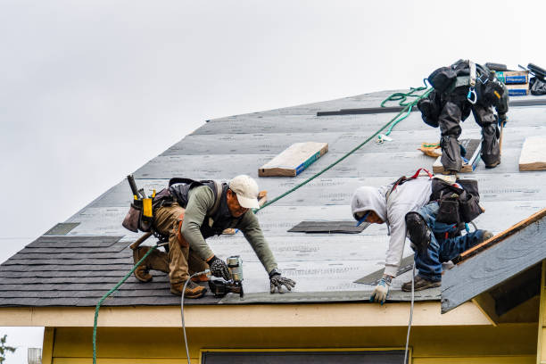 Professional Gutter Installation technician working in Miami, OK
